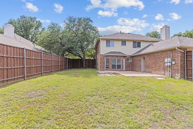 5400 Belle Chasse Ln, Frisco, TX 75035 - back of property with a patio area and brick siding