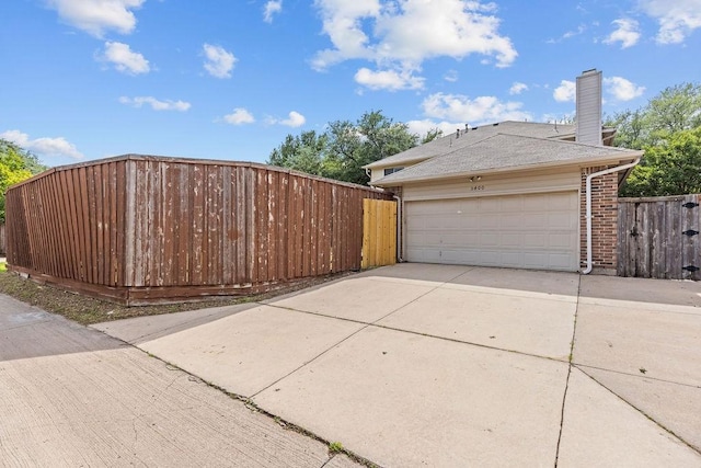 5400 Belle Chasse Ln, Frisco, TX 75035 - garage featuring driveway