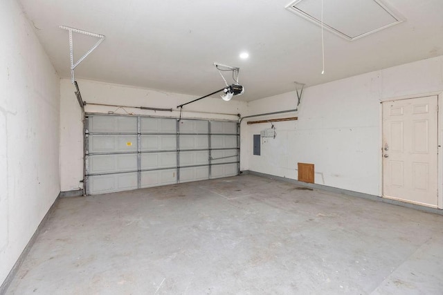 5400 Belle Chasse Ln, Frisco, TX 75035 - garage featuring electric panel and a garage door opener