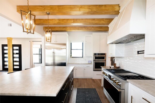 kitchen with white cabinets, sink, beamed ceiling, decorative light fixtures, and stainless steel appliances