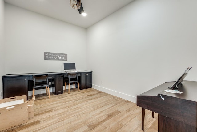 home office featuring light wood-type flooring