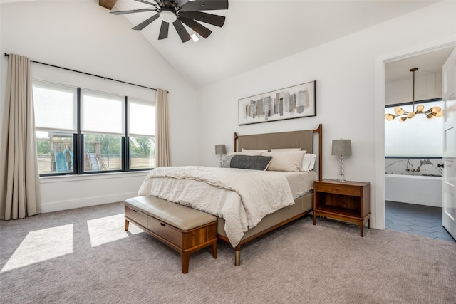 bedroom featuring carpet flooring, ceiling fan with notable chandelier, and vaulted ceiling