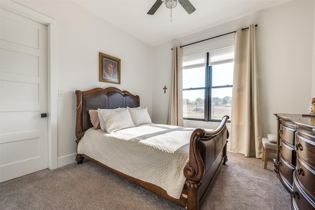 bedroom with ceiling fan and carpet