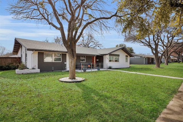 single story home featuring a front yard