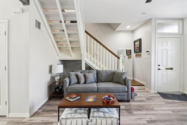 living room featuring light wood-type flooring