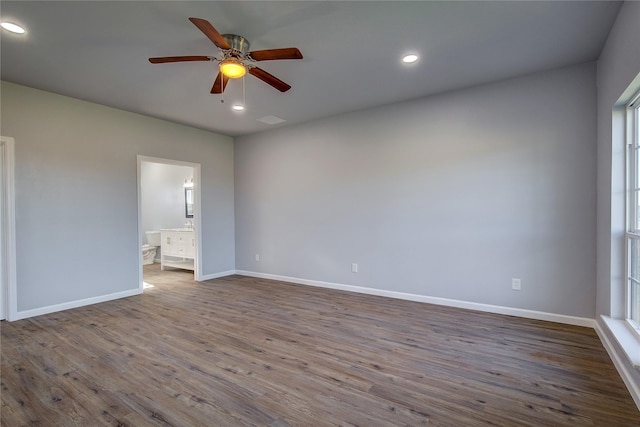 empty room with hardwood / wood-style flooring and ceiling fan