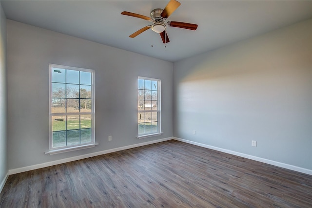 unfurnished room with hardwood / wood-style floors and ceiling fan