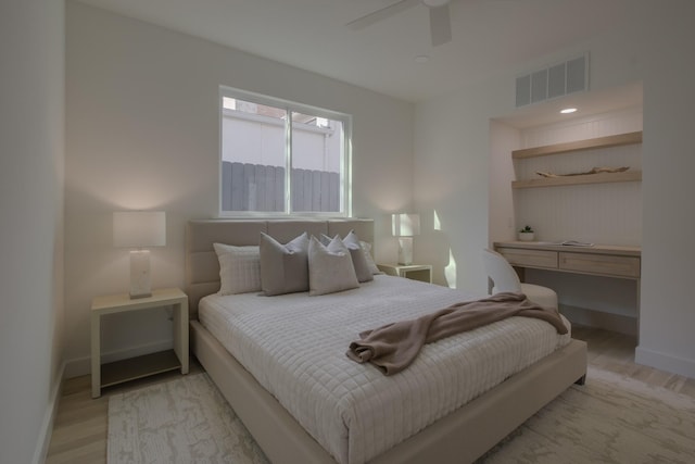 bedroom featuring ceiling fan and light hardwood / wood-style flooring