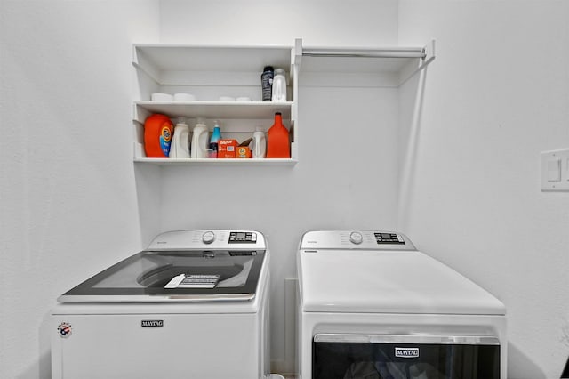 laundry room featuring independent washer and dryer