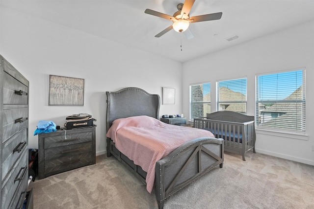 carpeted bedroom featuring ceiling fan