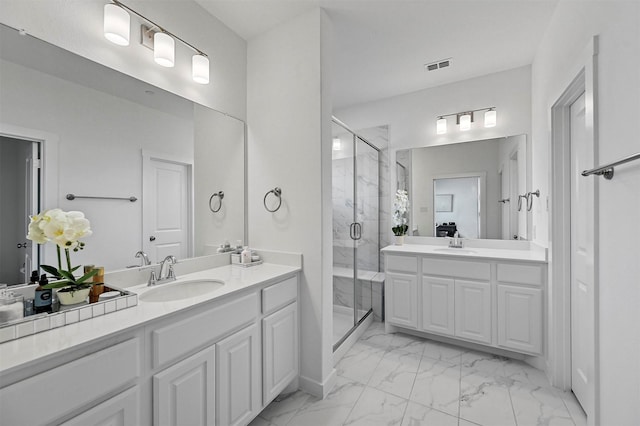 bathroom featuring vanity and walk in shower