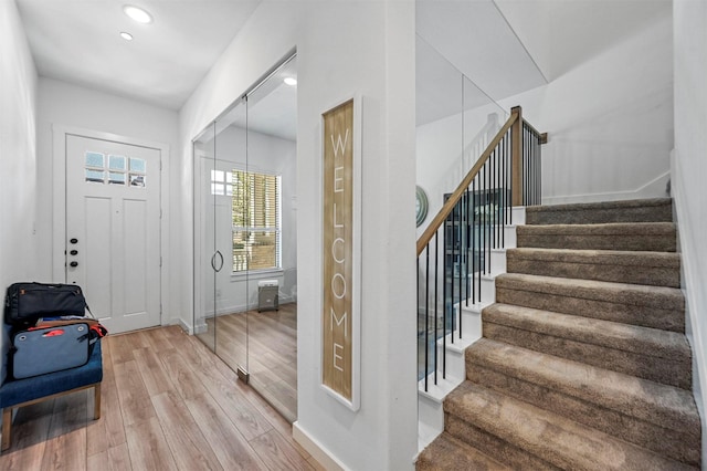 foyer entrance featuring hardwood / wood-style floors