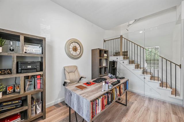 office space with hardwood / wood-style floors