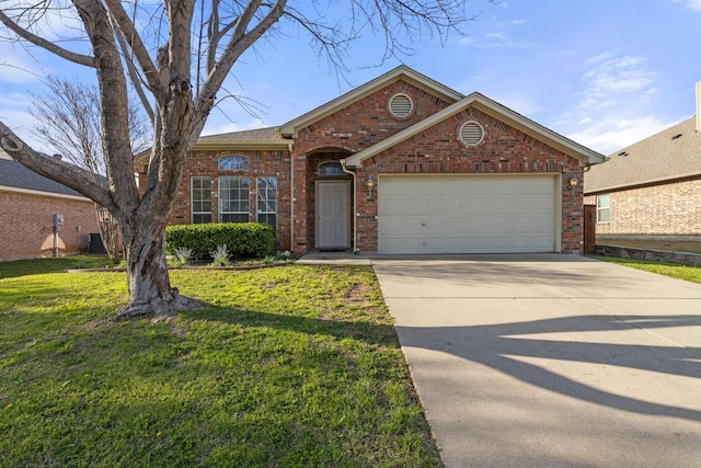 view of front facade with a front lawn and a garage