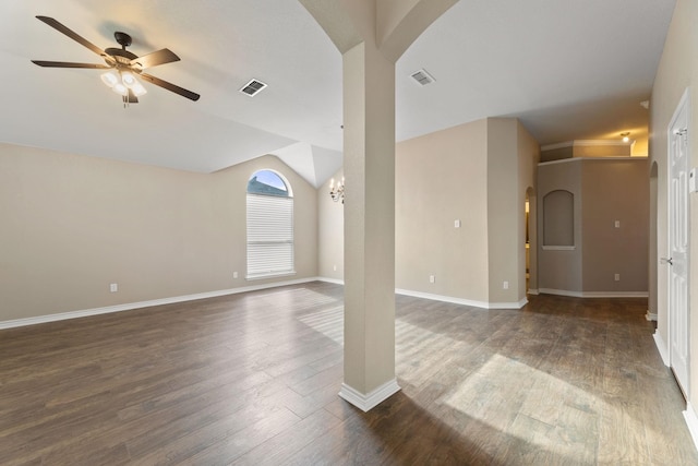 unfurnished living room with dark hardwood / wood-style floors, ceiling fan, and vaulted ceiling