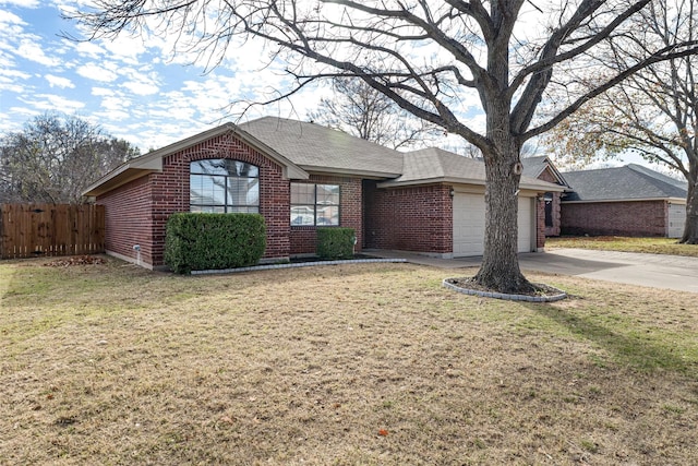 ranch-style house with a front yard and a garage