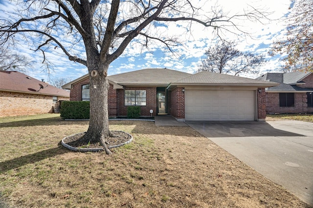 single story home featuring a front yard and a garage