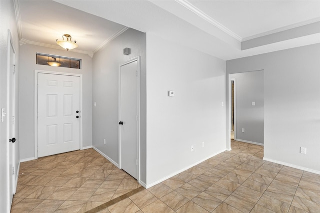 entryway featuring ornamental molding