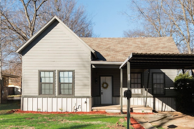 view of front of property with a carport