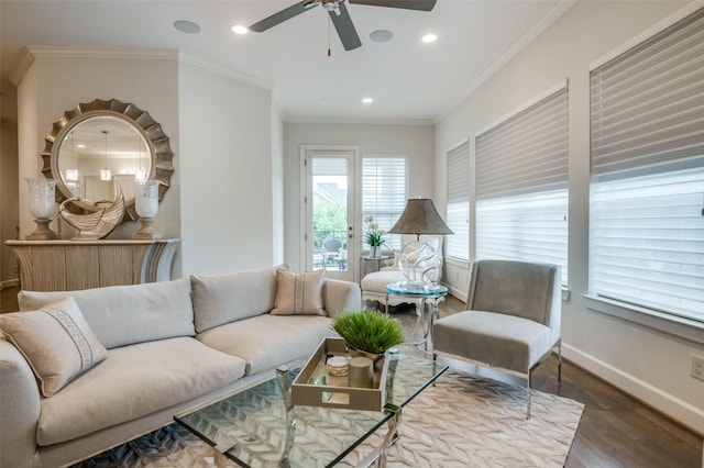 living room featuring ornamental molding, dark hardwood / wood-style floors, and ceiling fan