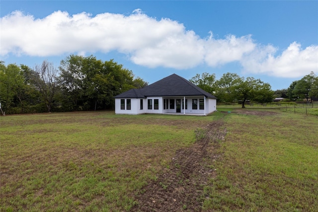 view of front of property with a front lawn