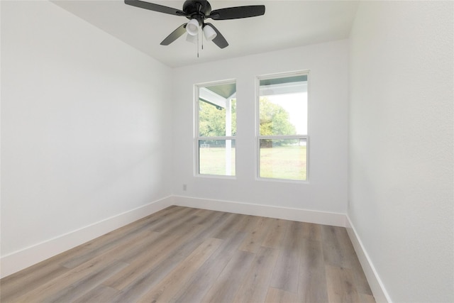 unfurnished room featuring ceiling fan and light hardwood / wood-style flooring