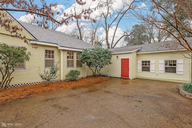 ranch-style home with a patio