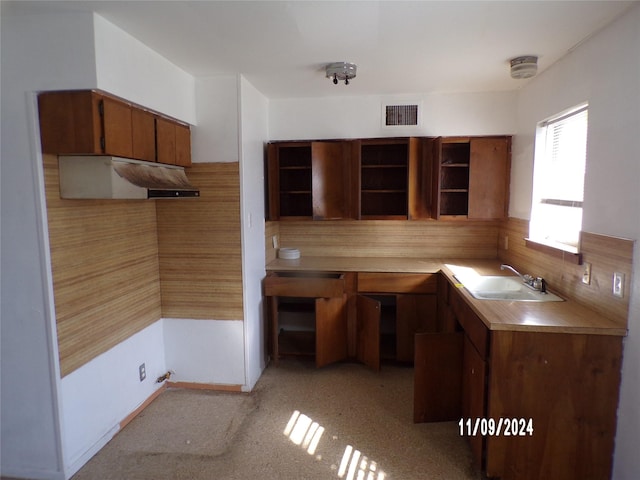 kitchen with decorative backsplash and sink