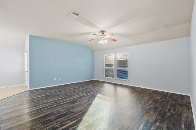 unfurnished room featuring dark hardwood / wood-style floors and ceiling fan