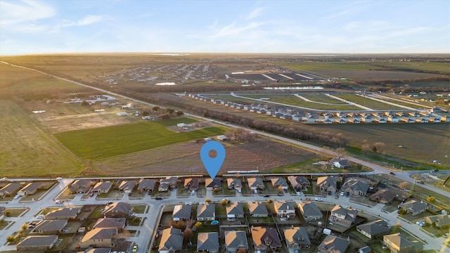 birds eye view of property featuring a rural view