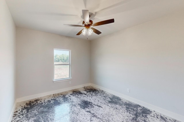 unfurnished room with concrete floors and ceiling fan