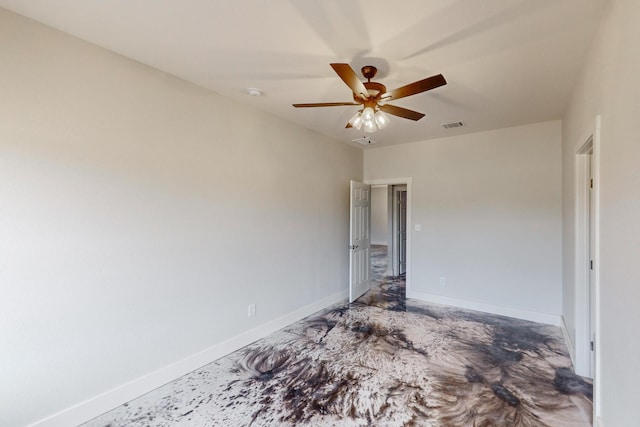 empty room featuring ceiling fan