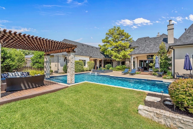 view of pool featuring a pergola, a patio, an outdoor hangout area, and a lawn