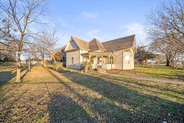 view of front facade with a porch and a front yard