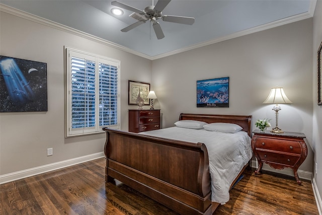 bedroom with crown molding, dark hardwood / wood-style floors, and ceiling fan