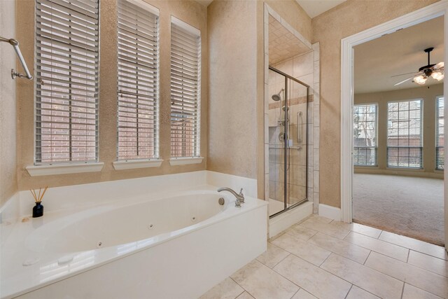 bathroom featuring tile patterned floors, ceiling fan, and independent shower and bath