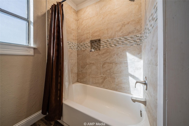 bathroom with shower / bath combo with shower curtain