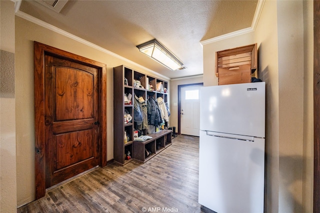 mudroom featuring a textured ceiling, crown molding, and hardwood / wood-style floors