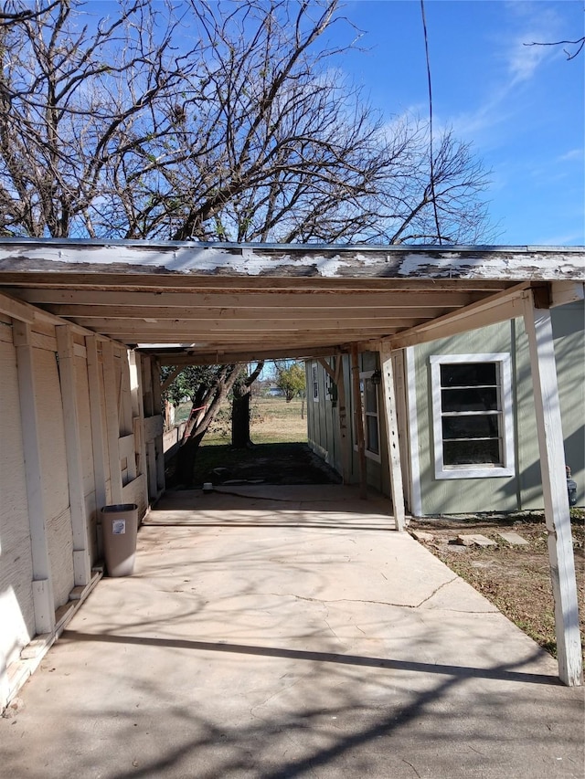 view of parking featuring a carport