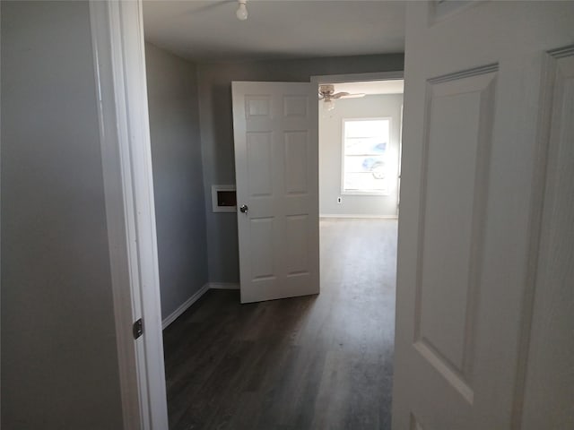 hallway featuring dark hardwood / wood-style floors