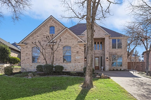 view of front of home with a front lawn