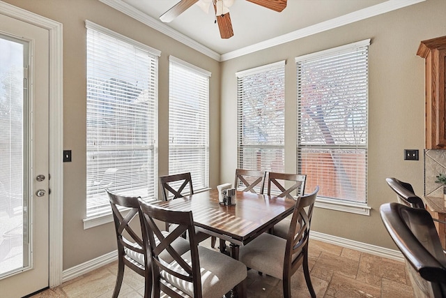 dining room with ceiling fan, crown molding, and a healthy amount of sunlight