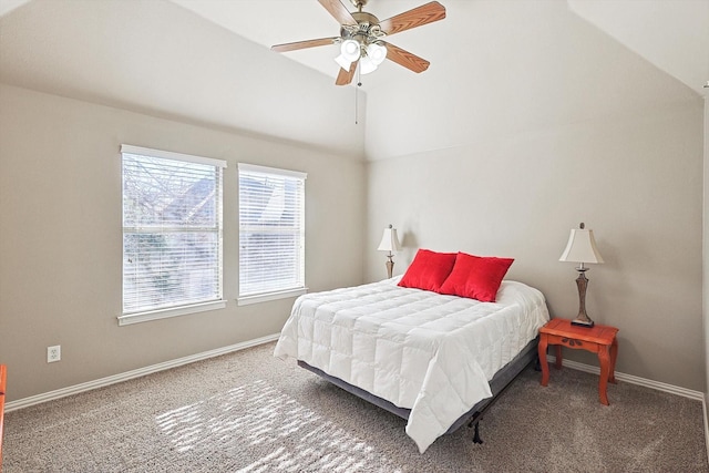 carpeted bedroom featuring vaulted ceiling and ceiling fan