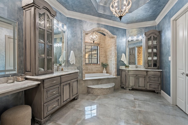 bathroom featuring vanity, a notable chandelier, a relaxing tiled tub, and crown molding