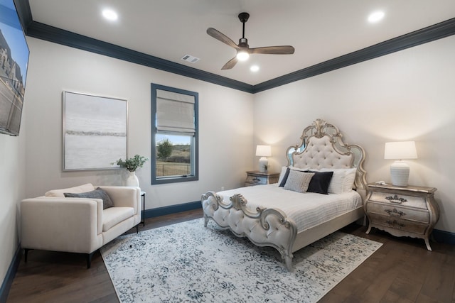 bedroom with ceiling fan, dark hardwood / wood-style flooring, and crown molding