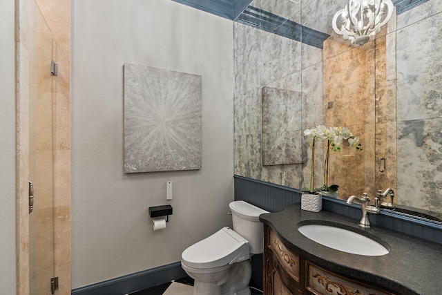 bathroom with toilet and vanity