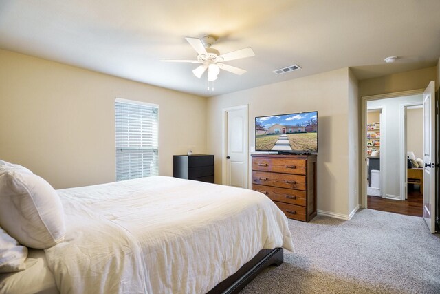 carpeted bedroom featuring ceiling fan