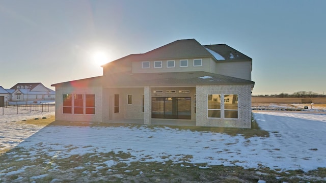 view of snow covered property