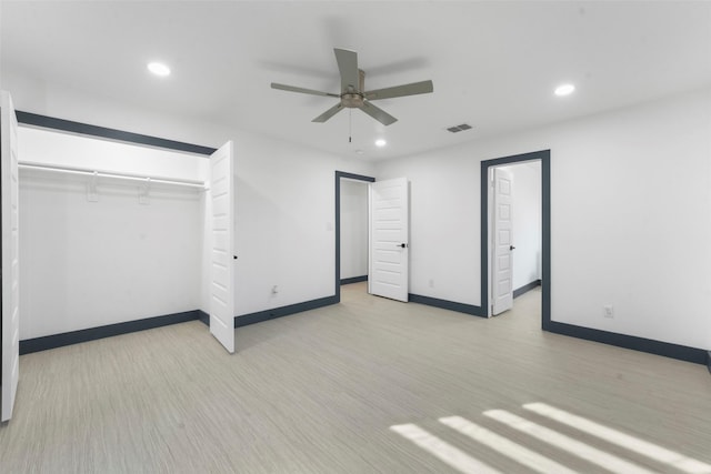 unfurnished bedroom with baseboards, visible vents, a closet, and recessed lighting