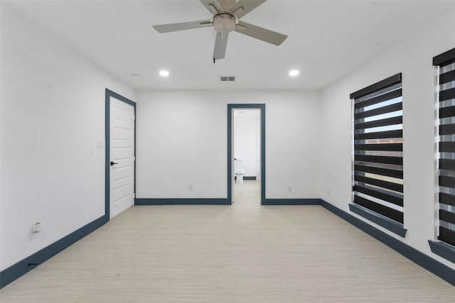 unfurnished room featuring light wood finished floors, recessed lighting, visible vents, ceiling fan, and baseboards